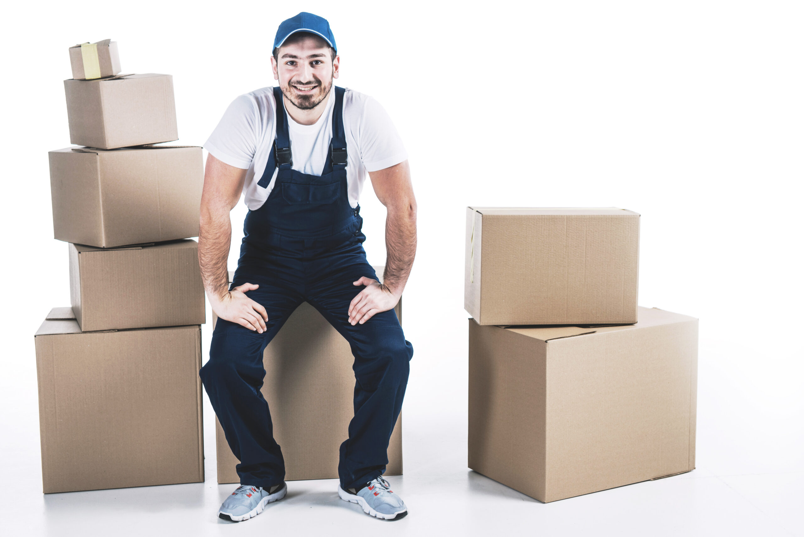 smiling-deliveryman-near-carton-boxes